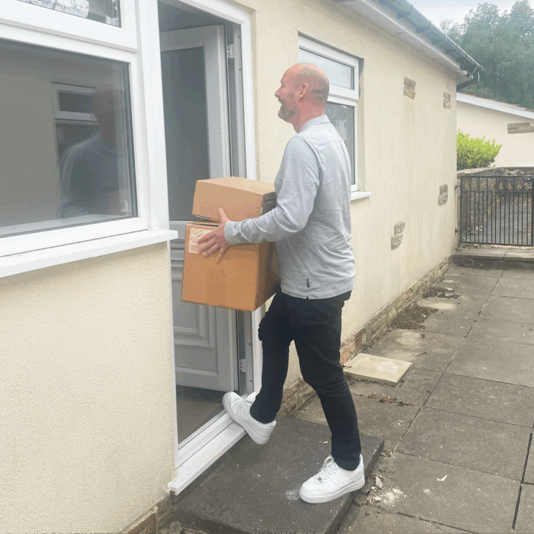 Patchett Homes tenant moving into his new home with boxes