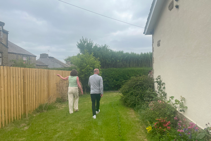 Patchett Homes employee showing a tenant around