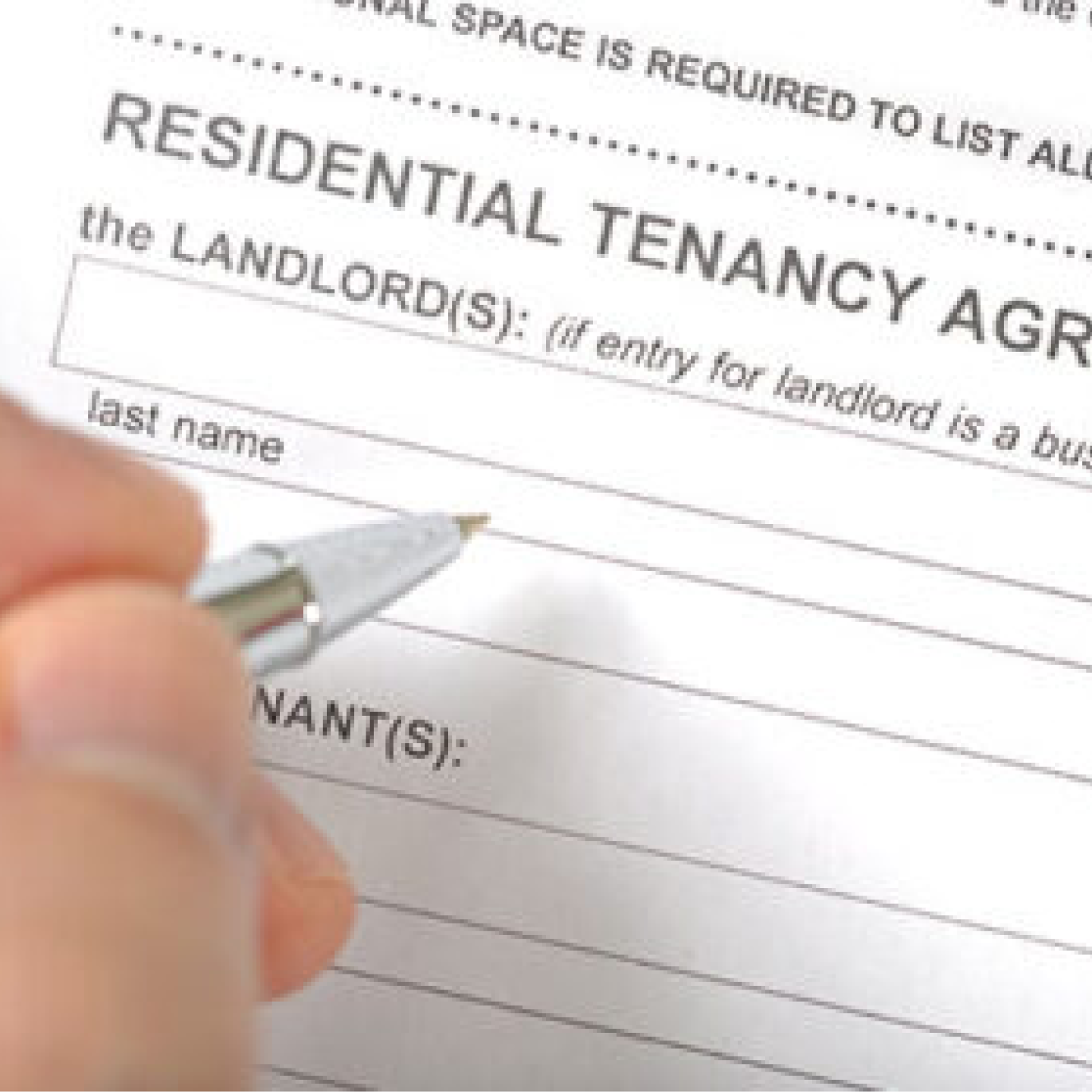 Tenant signing a Tenancy agreement